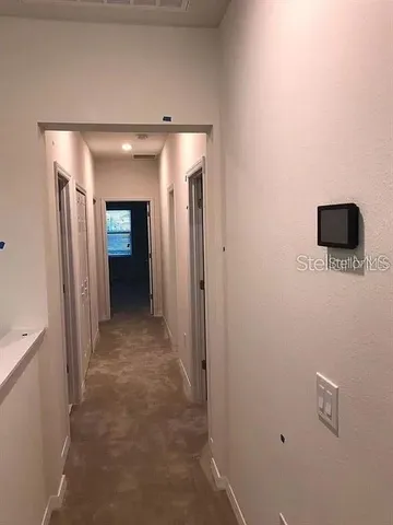 a view of a hallway with a hallway