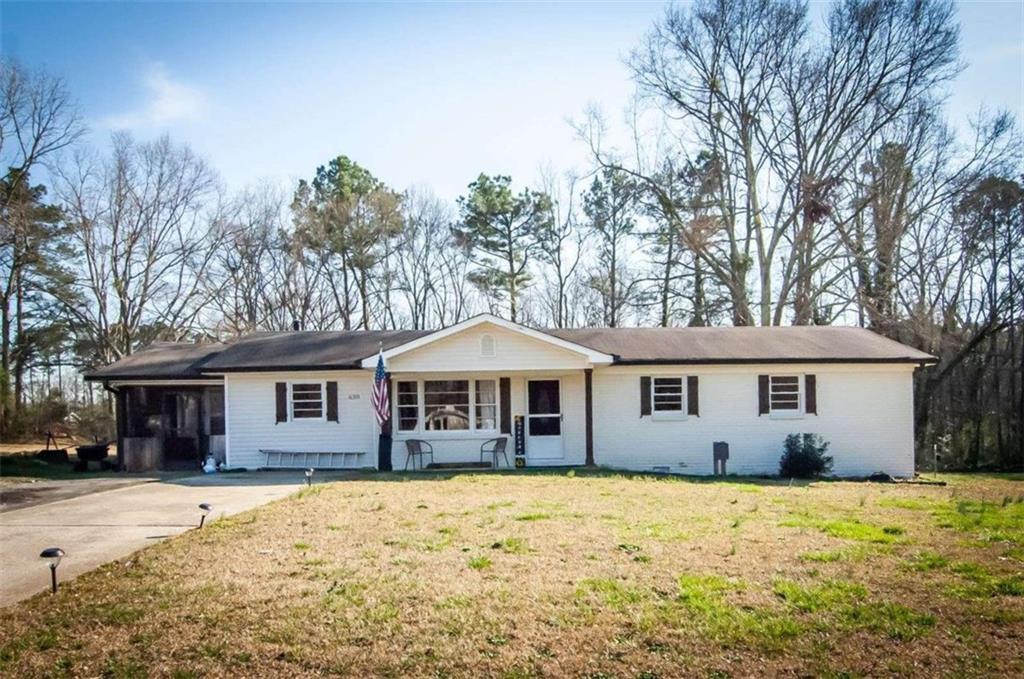 630 Morris Road Hiram, GA 30141 - Photo 1 of 1 a front view of a house with a yard