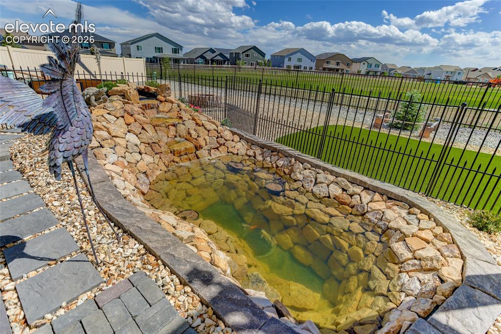 9734 Hidden Ranch Court Peyton, CO 80831 - Photo 25 of 29 Backyard water feature