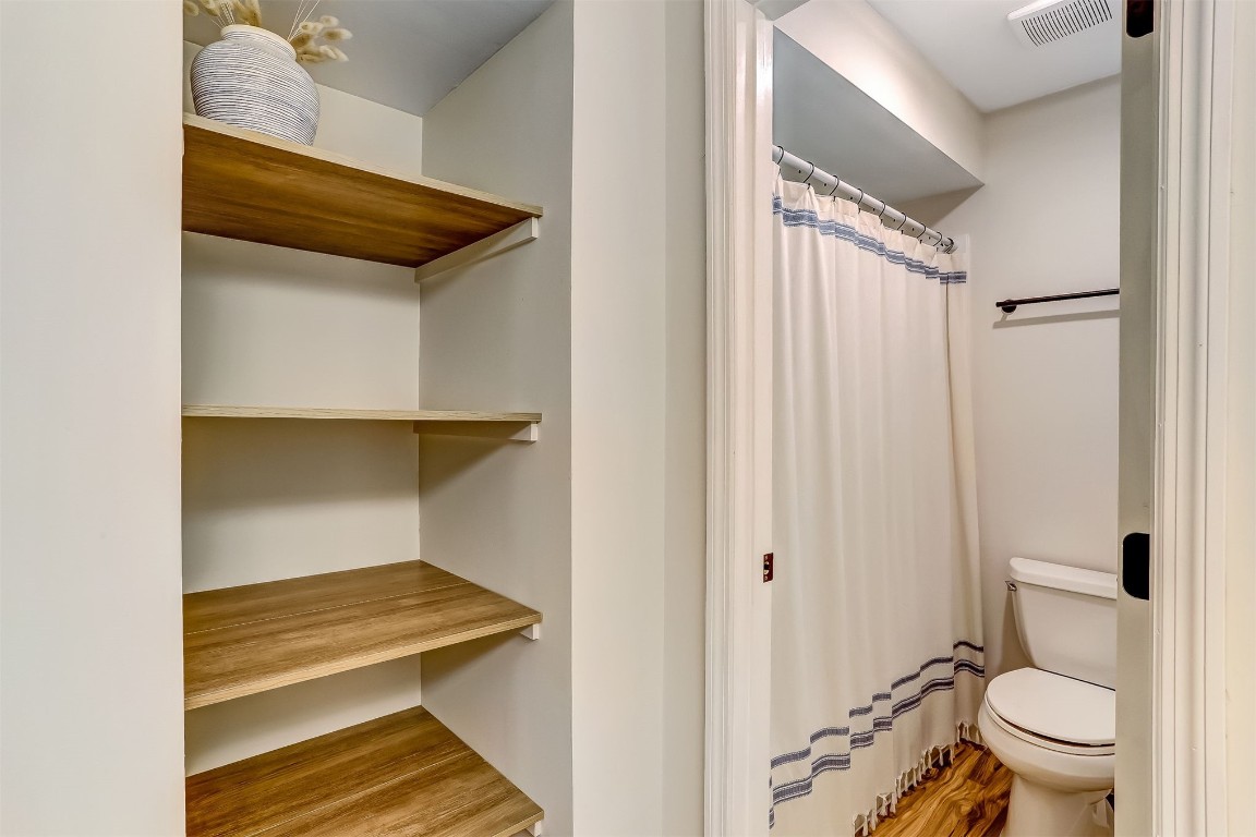 2563 Forest Ridge Drive, Unit P3 Fernandina Beach, FL 32034 - Photo 24 of 44 a bathroom with a toilet and a shower