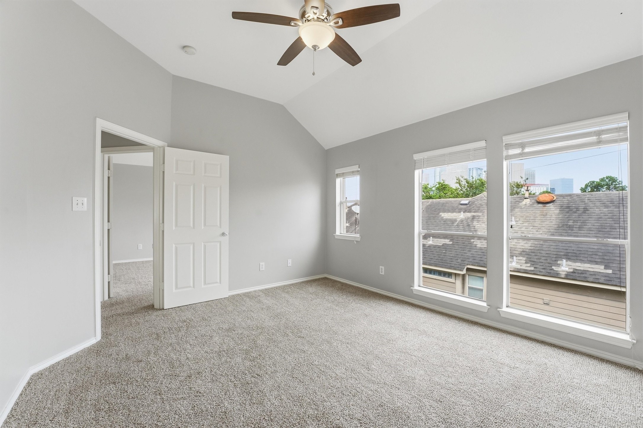 1507 Sutton Street Houston, TX 77006 - Photo 22 of 31 an empty room with windows