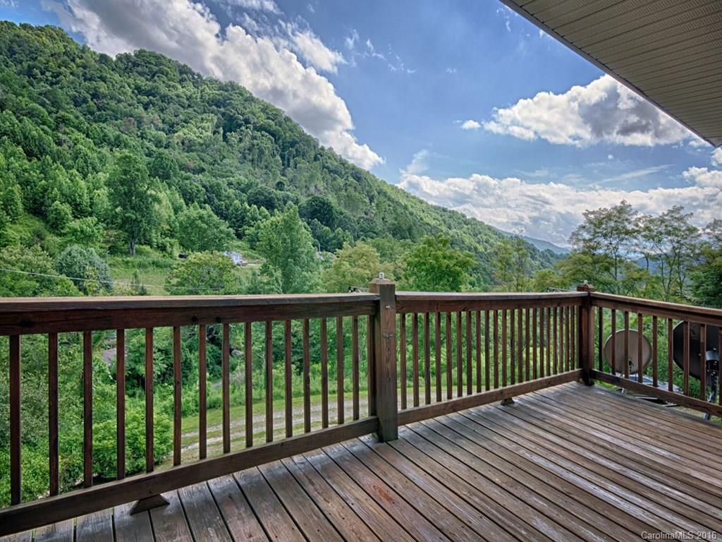 1059 Sugar Cove Road Clyde, NC 28721 - Photo 2 of 14 a view of balcony with wooden floor