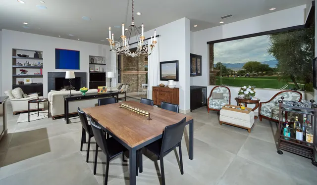 a large kitchen with stainless steel appliances a large center island and a sink
