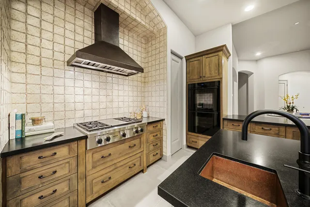 a view of a golf course with a lake view