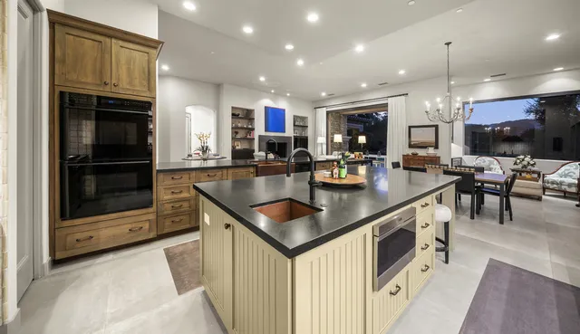 a view of a house with swimming pool