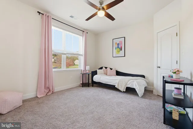 a bathroom with a sink vanity and a mirror