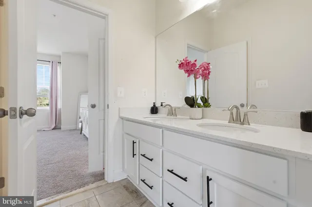 an empty room with wooden floor