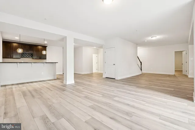 a view of a house with swimming pool and a yard