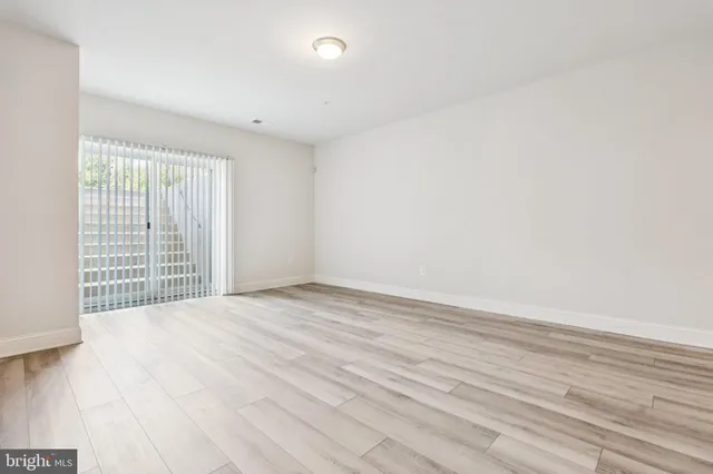a view of a house with pool and a yard