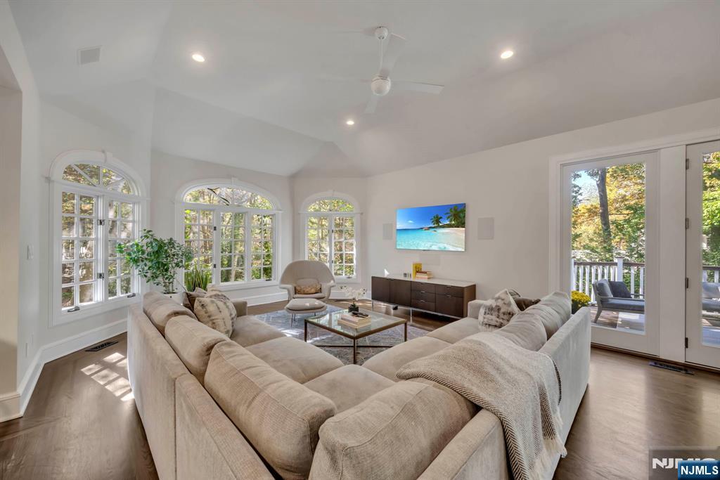 64 Park Slope Ridgewood, NJ 07450 - Photo 13 of 47 a living room with furniture and a large window