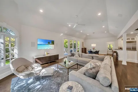 a living room with furniture and a table
