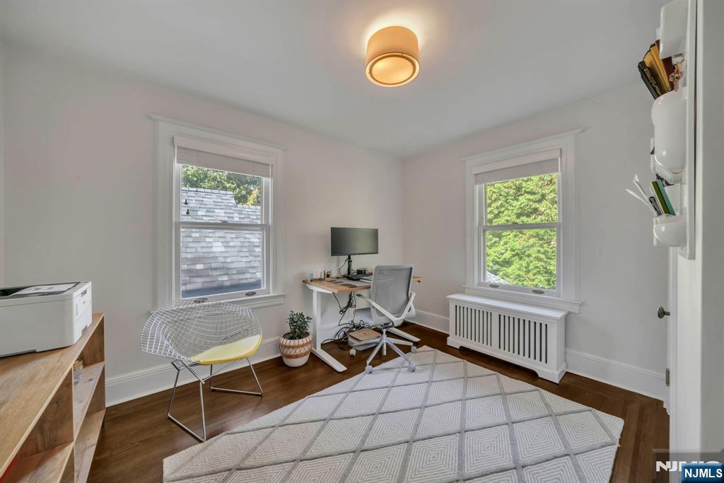 64 Park Slope Ridgewood, NJ 07450 - Photo 22 of 47 a work room with furniture and a window