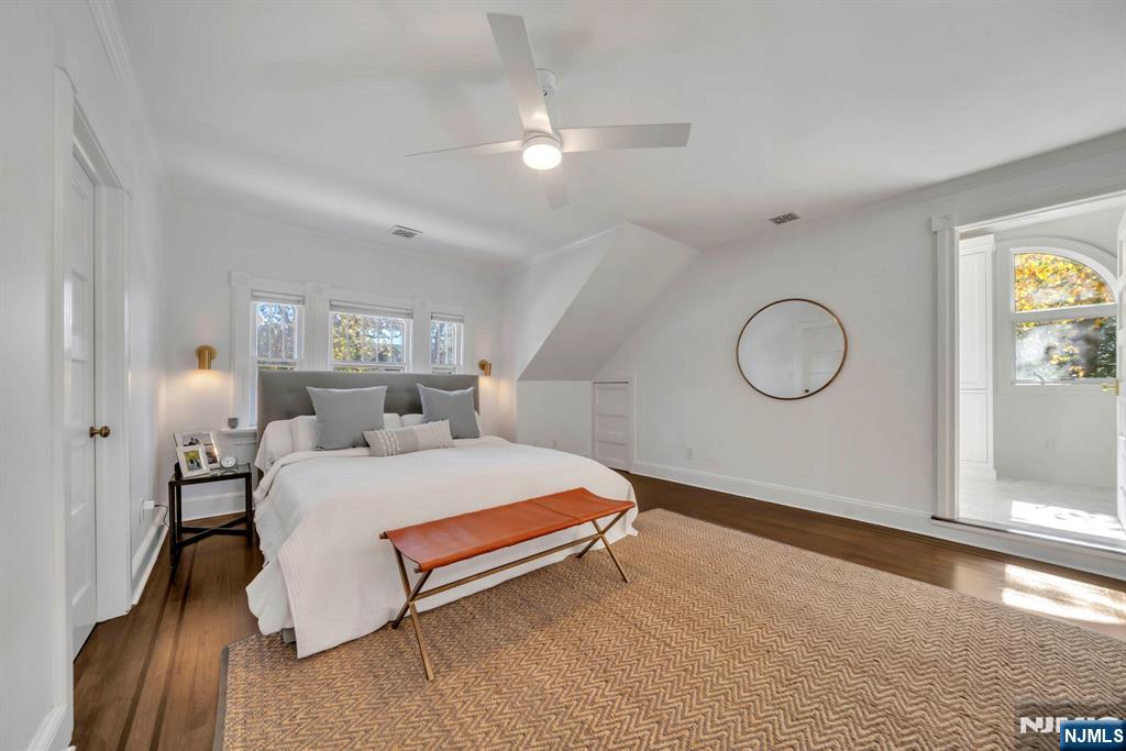 64 Park Slope Ridgewood, NJ 07450 - Photo 29 of 47 a bedroom with a bed and window