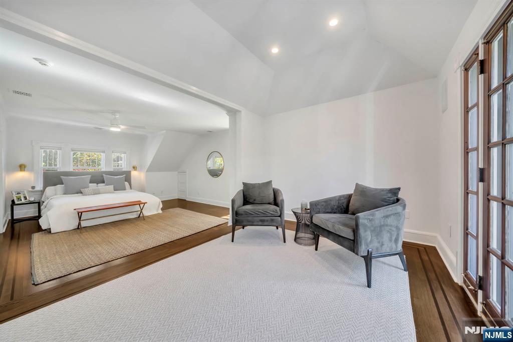 64 Park Slope Ridgewood, NJ 07450 - Photo 30 of 47 a bedroom with furniture and a couch