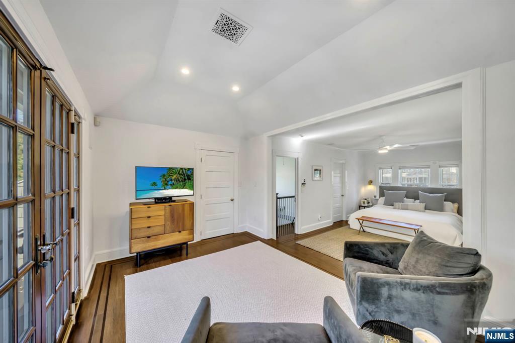 64 Park Slope Ridgewood, NJ 07450 - Photo 35 of 47 a bedroom with a bed a couch and dresser