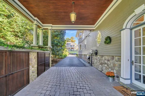 a view of a pathway along with wooden stairs