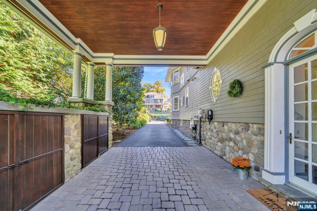 64 Park Slope Ridgewood, NJ 07450 - Photo 44 of 47 a view of a pathway along with wooden stairs