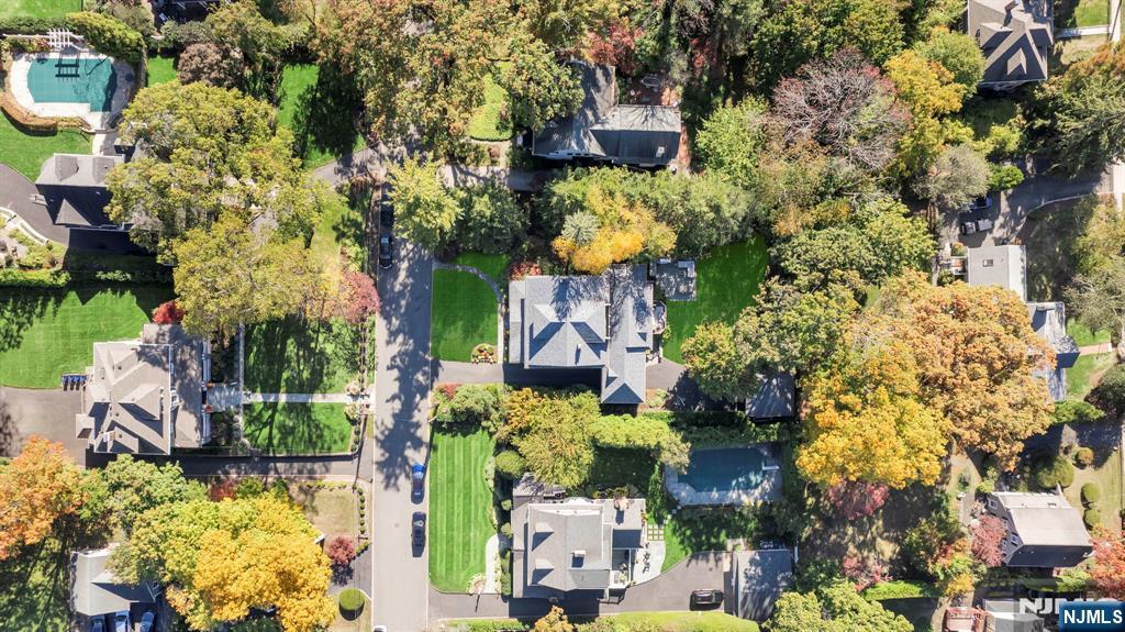 64 Park Slope Ridgewood, NJ 07450 - Photo 47 of 47 an aerial view of a house with a yard and garden