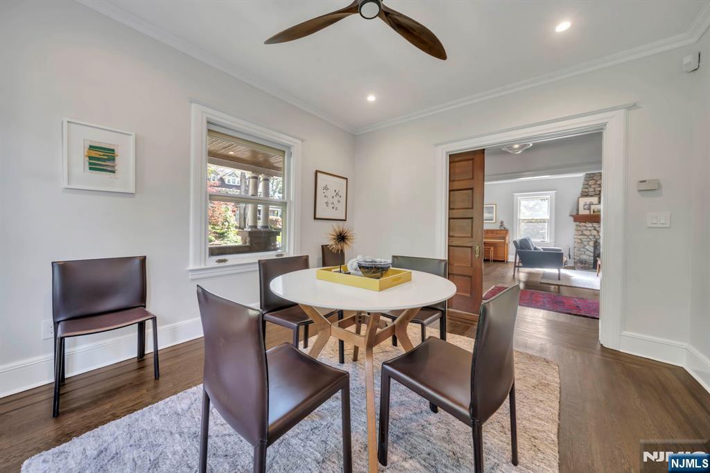 64 Park Slope Ridgewood, NJ 07450 - Photo 8 of 47 a view of a dining room with furniture and wooden floor