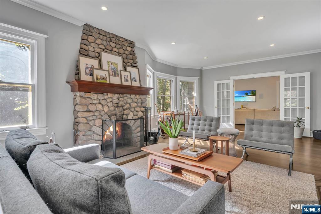 64 Park Slope Ridgewood, NJ 07450 - Photo 9 of 47 a living room with furniture and a fireplace