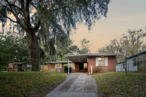 front view of a house with a yard