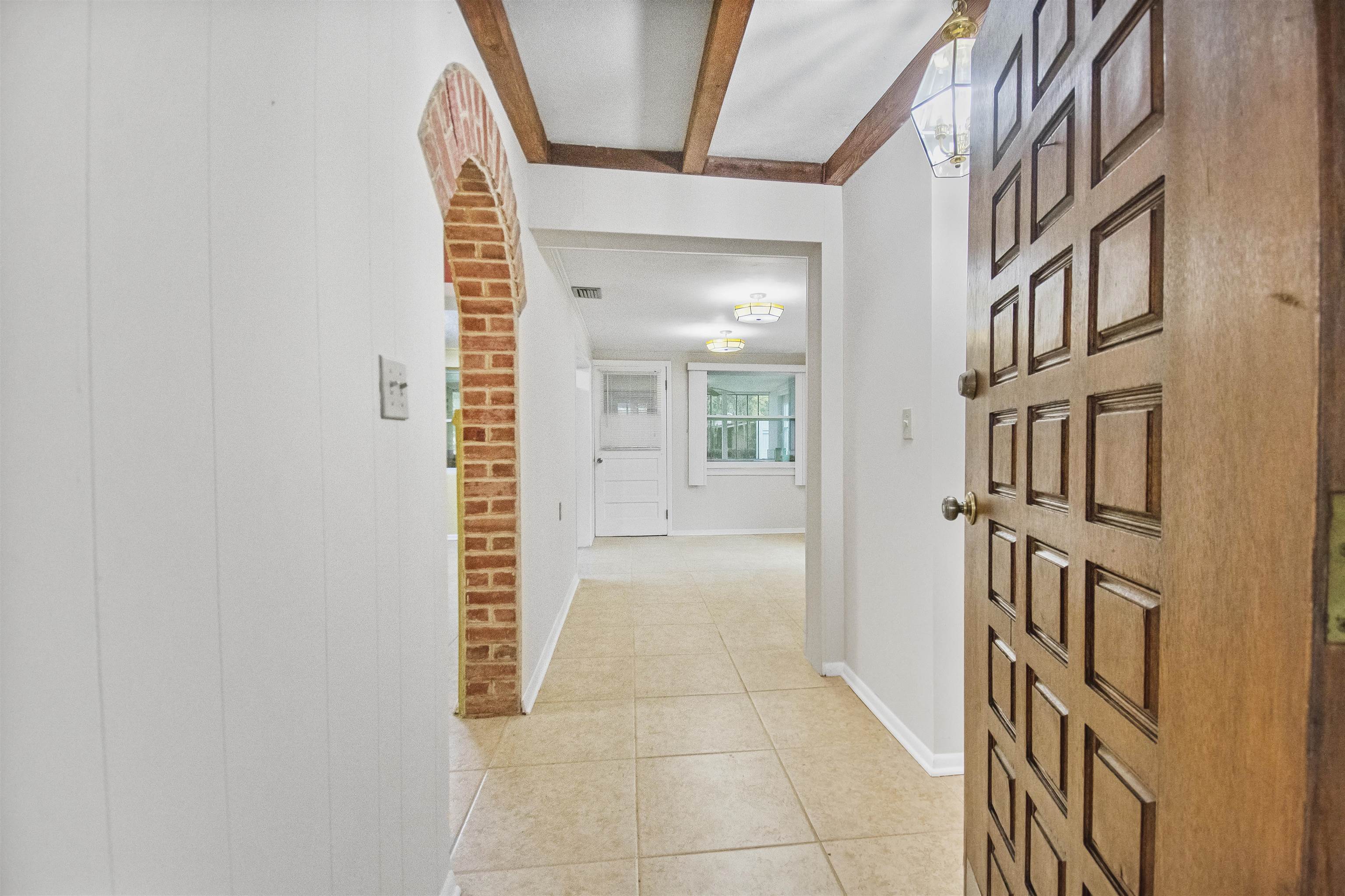 100 Spring Street St. Augustine, FL 32084 - Photo 2 of 21 a view of an entryway with a livingroom