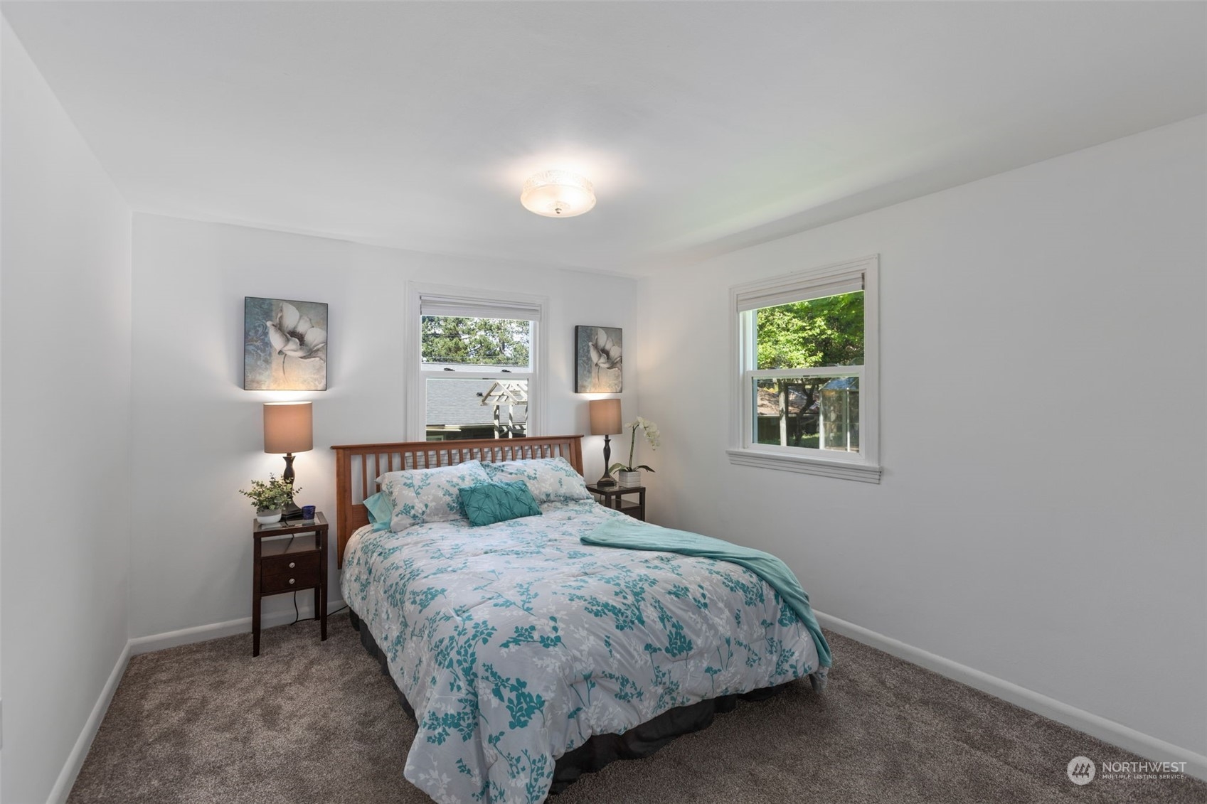 11616 6th Avenue Southwest Seattle, WA 98146 - Photo 12 of 37 a bedroom with a bed and window
