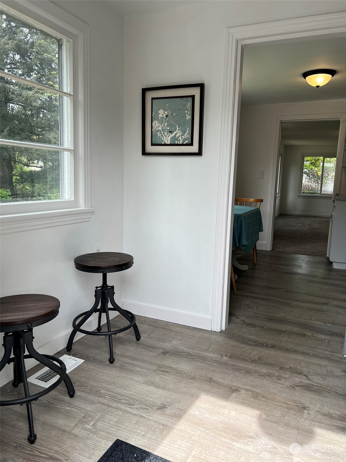 11616 6th Avenue Southwest Seattle, WA 98146 - Photo 19 of 37 a view of a livingroom with a table and a window