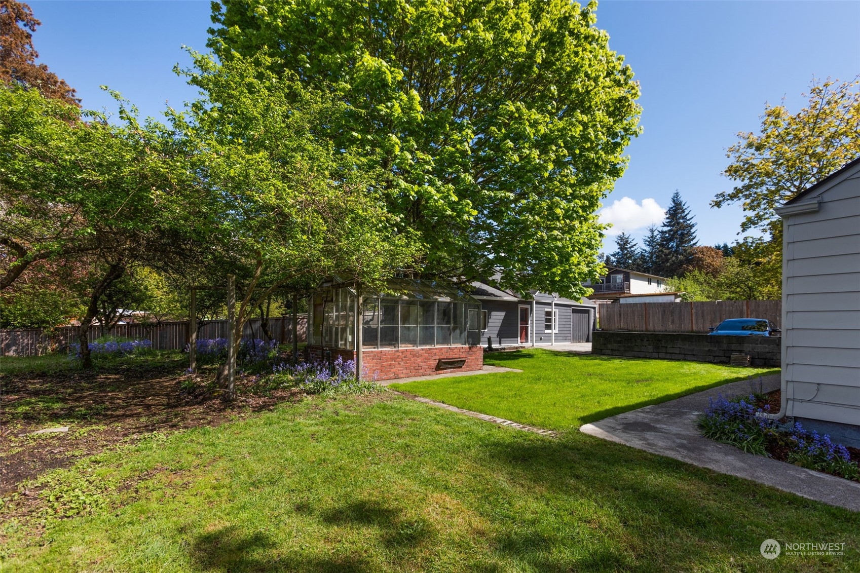 11616 6th Avenue Southwest Seattle, WA 98146 - Photo 22 of 37 a view of a backyard with a garden
