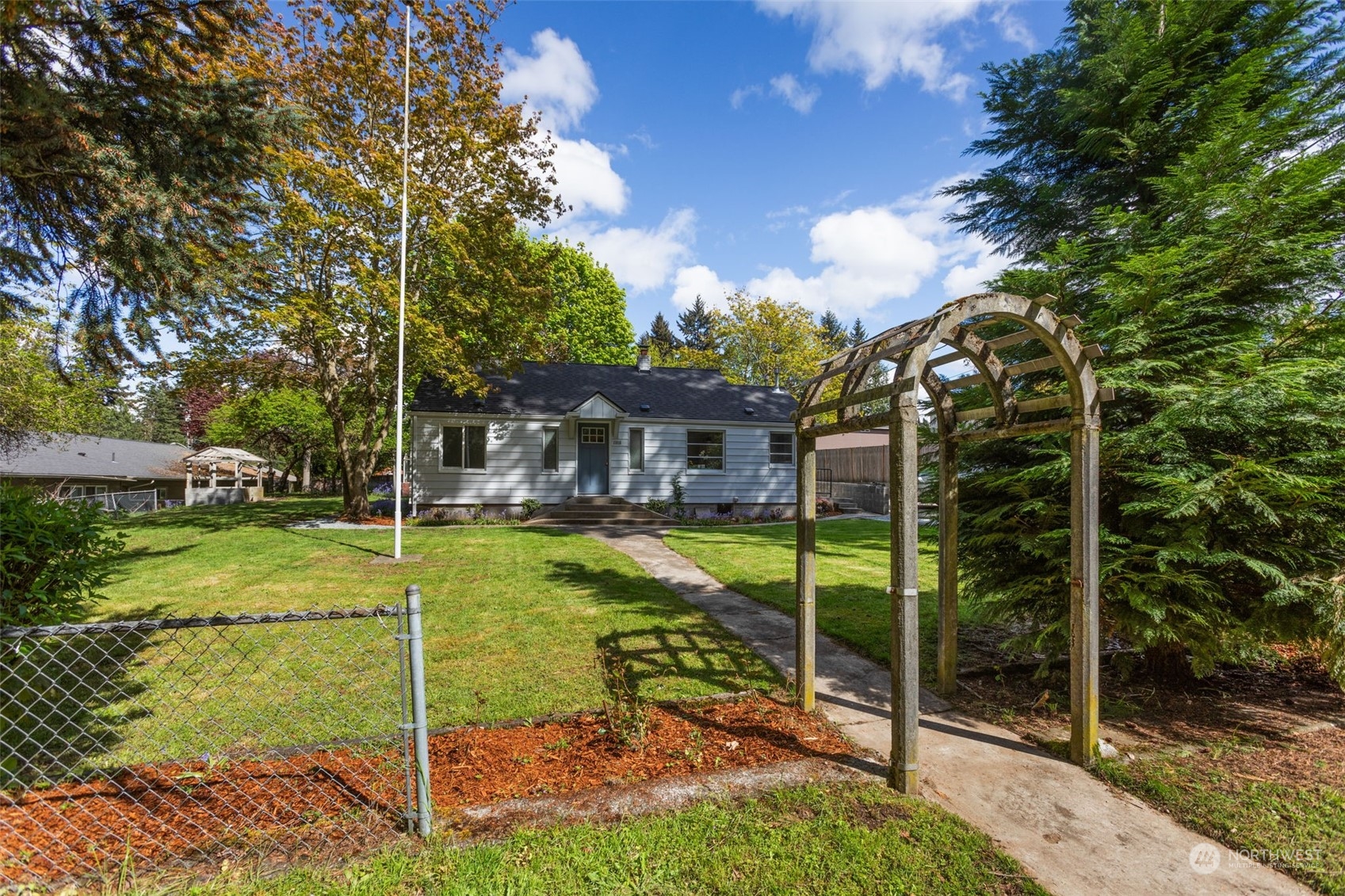11616 6th Avenue Southwest Seattle, WA 98146 - Photo 33 of 37 a view of a house with backyard and sitting area