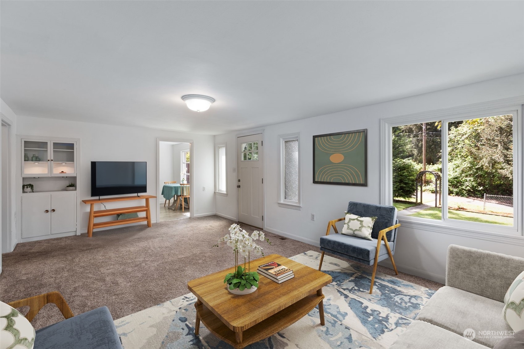 11616 6th Avenue Southwest Seattle, WA 98146 - Photo 8 of 37 a living room with furniture and a flat screen tv