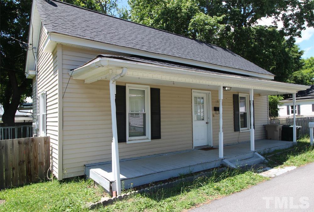 110 Emory Street Garner, NC 27529 - Photo 1 of 22 a front view of a house with garden