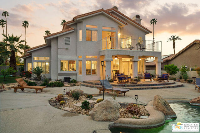 364 Oakmont Drive Palm Desert, CA 92211 - Photo 28 of 74 a view of a building with sitting area and furniture