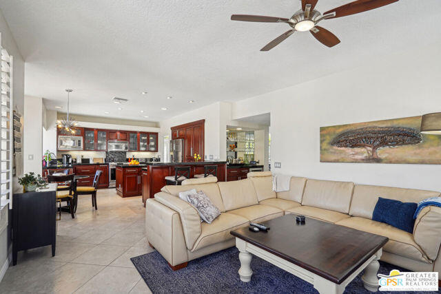 364 Oakmont Drive Palm Desert, CA 92211 - Photo 47 of 74 a living room with furniture and a view of kitchen