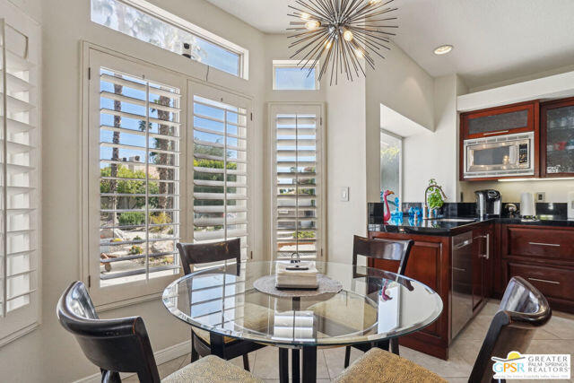 364 Oakmont Drive Palm Desert, CA 92211 - Photo 49 of 74 a dining room with furniture and window