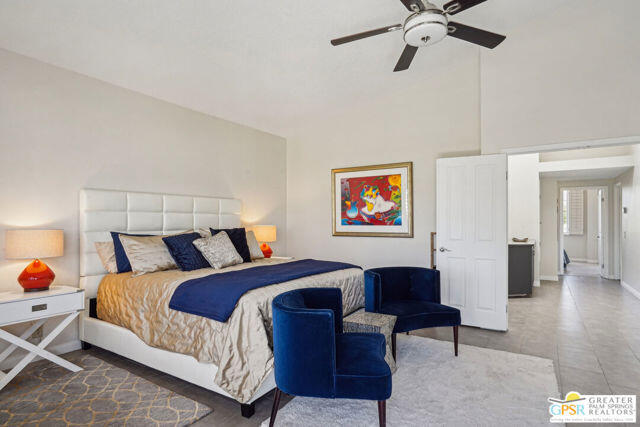 364 Oakmont Drive Palm Desert, CA 92211 - Photo 55 of 74 a bed room with bed and window