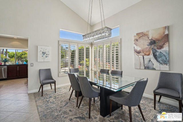 364 Oakmont Drive Palm Desert, CA 92211 - Photo 70 of 74 a view of a dining room with furniture window and outside view