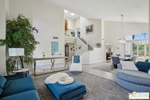 364 Oakmont Drive Palm Desert, CA 92211 - Photo 73 of 74 a living room with furniture and a wooden floor