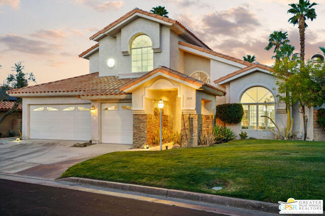 364 Oakmont Drive Palm Desert, CA 92211 - Photo 8 of 74 a front view of a house with a yard