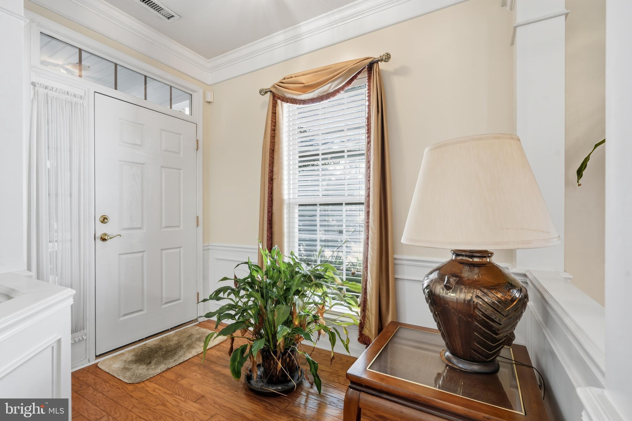 29 Pennington Court Delanco, NJ 08075 - Photo 12 of 57 a room with furniture and a potted plant