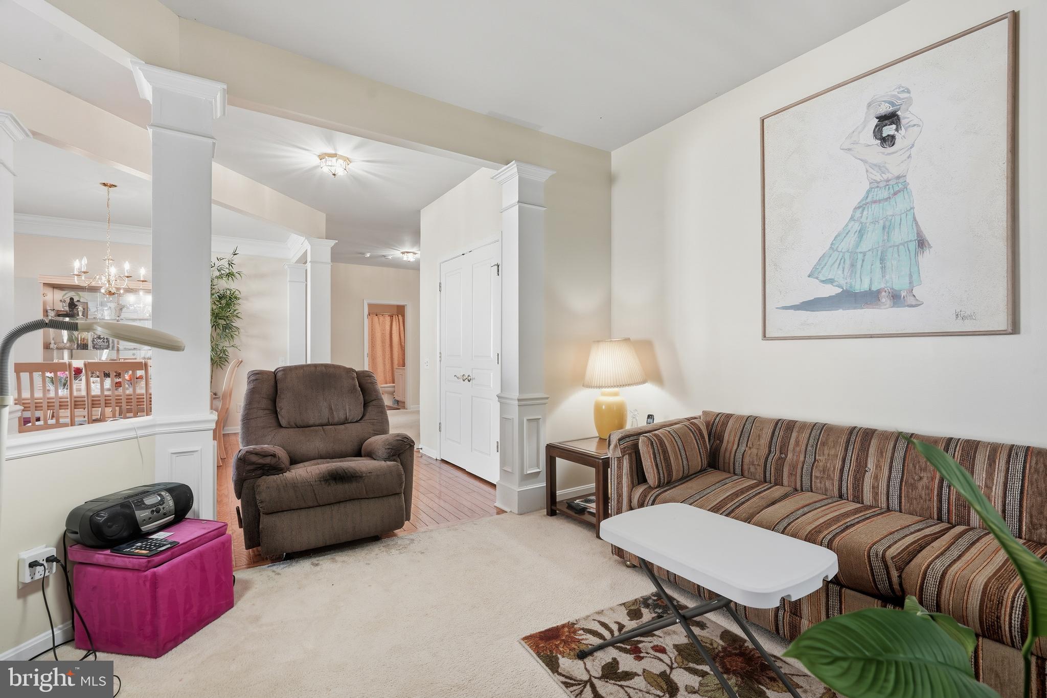 29 Pennington Court Delanco, NJ 08075 - Photo 14 of 57 a living room with furniture a couch and a potted plant