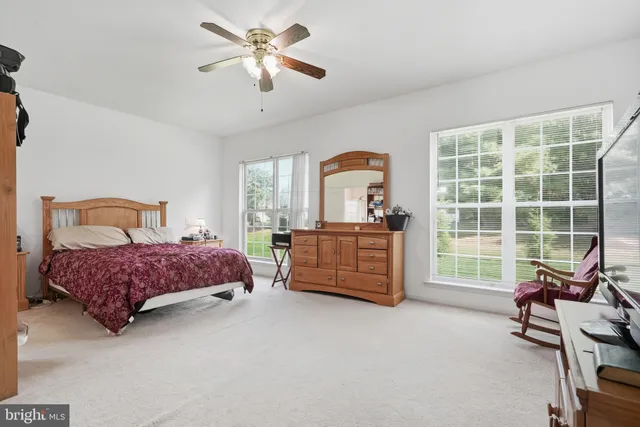 a view of a chairs and table in a patio