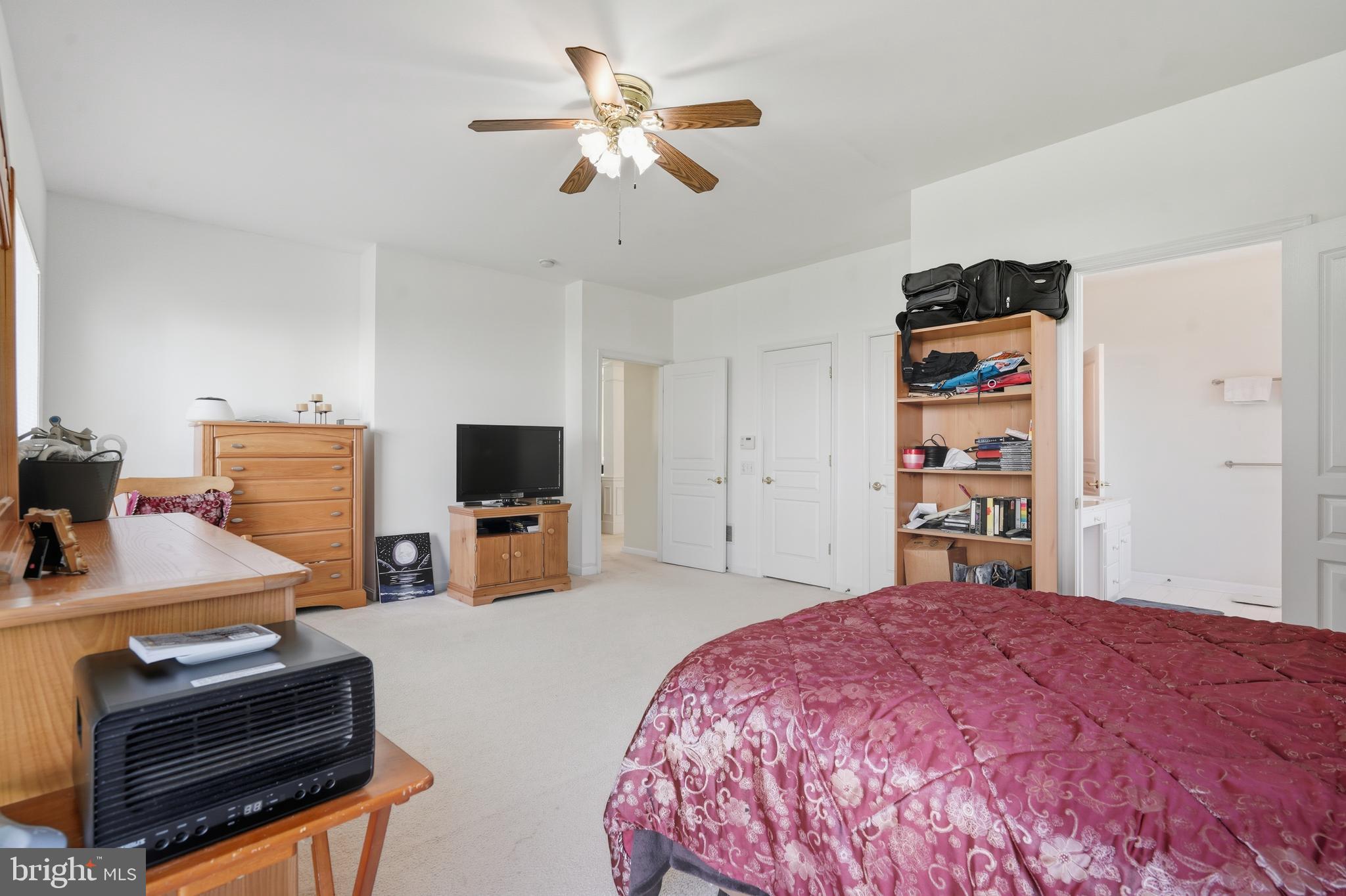 29 Pennington Court Delanco, NJ 08075 - Photo 21 of 57 a bedroom with a bed and a flat screen tv