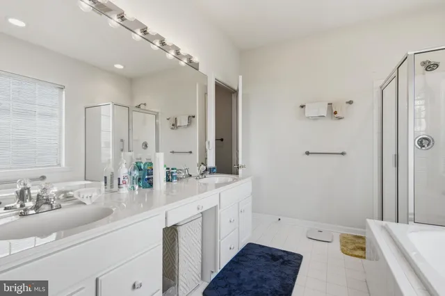 an aerial view of residential house with outdoor space and swimming pool