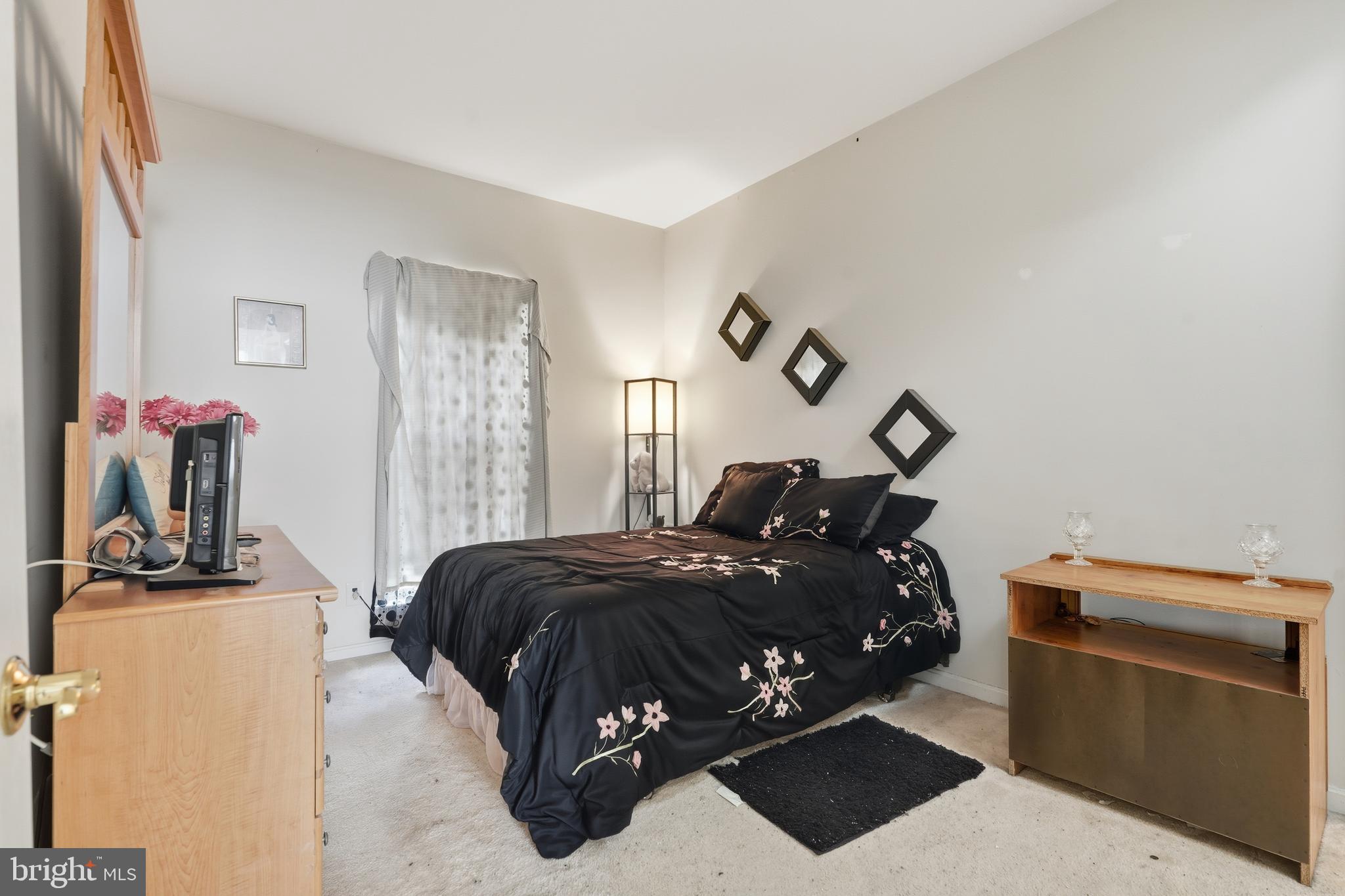 29 Pennington Court Delanco, NJ 08075 - Photo 27 of 57 a bedroom with a bed and large windows