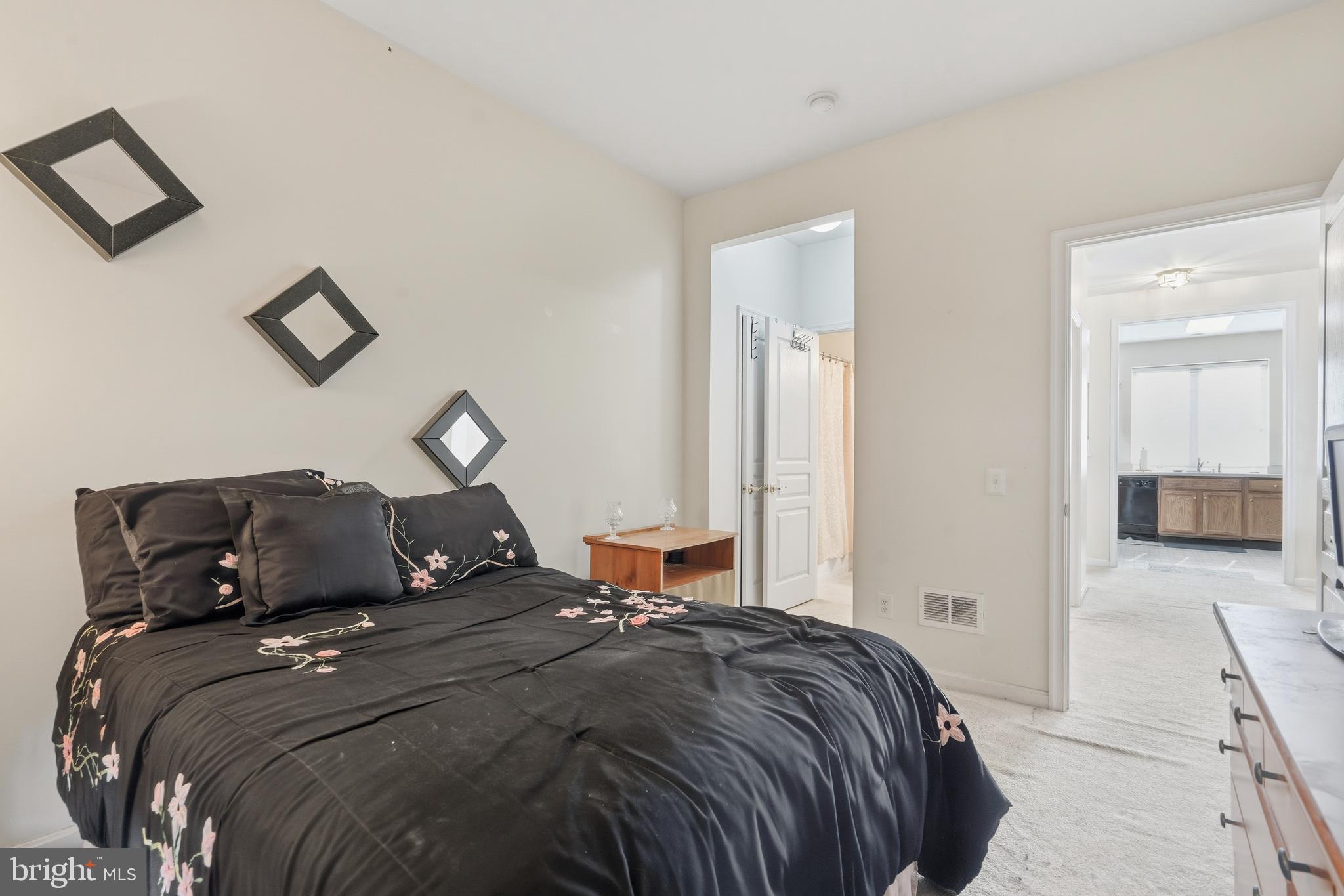 29 Pennington Court Delanco, NJ 08075 - Photo 28 of 57 a bedroom with a bed and a night stand