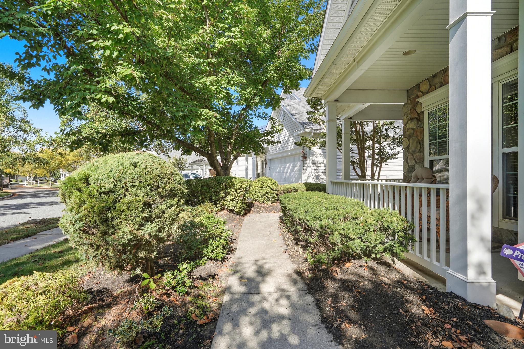 29 Pennington Court Delanco, NJ 08075 - Photo 54 of 57 a view of a pathway with a flower garden