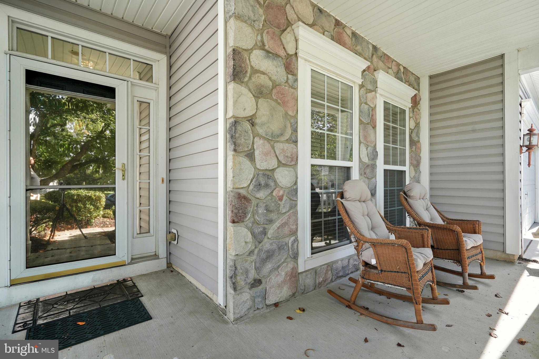 29 Pennington Court Delanco, NJ 08075 - Photo 57 of 57 a view of a front door and bench in back yard