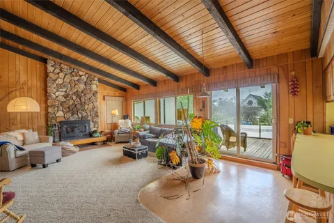 a living room with couch and a table