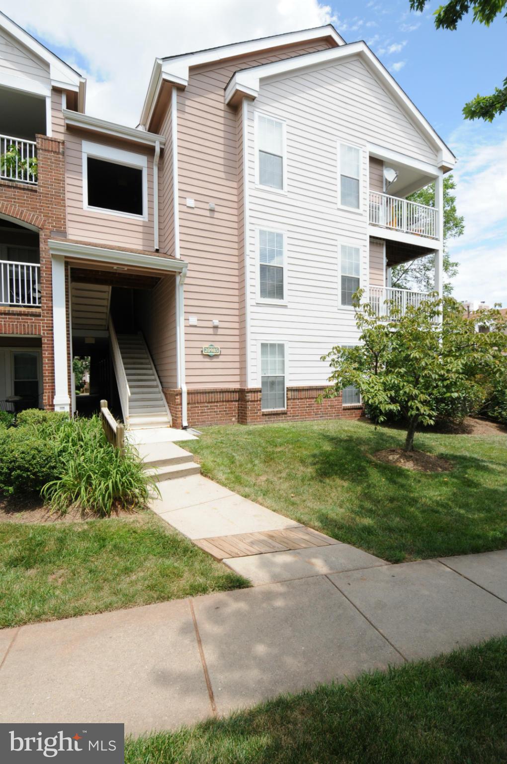 20985 Timber Ridge Terrace, Unit 204 Ashburn, VA 20147 - Photo 1 of 21 Exterior (Front)